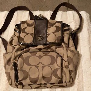 A medium size coach backpack, Brown and tan